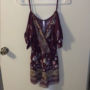purple romper w/ floral designs (worn once)